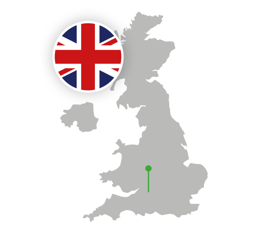Outline of the country Great Britain with a flag and a marker on the capital city
